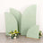 Green decorative panels with floral arrangement in front.
