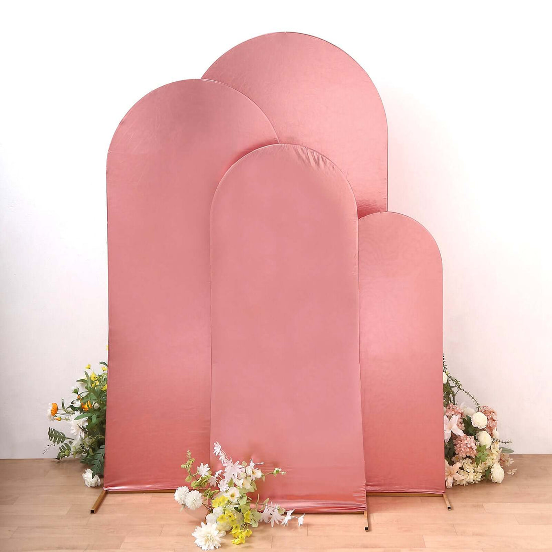 Pink backdrop set in various sizes with floral accents.