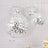 Silver disco ball decorations hanging in a stylish setting.