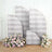 Decorative wooden backdrops with floral arrangements in a studio setting.
