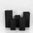 Black geometric display pedestals in various heights on a plain background.