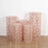 Set of five decorative rose gold lace cylinders