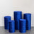 Set of five blue velvet display pedestals in various heights.