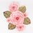 Pink paper roses with gold leaves on a plain background