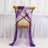 Purple sheer chair sashes draped elegantly on a wooden chair.