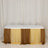 Table with brown and yellow layered drapery