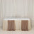 Table with elegant draped fabric in cream and taupe colors