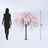 Pink cherry blossom tree with 5 ft height next to silhouette for scale.
