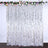 White sequin curtain draped with floral accents for event decoration.
