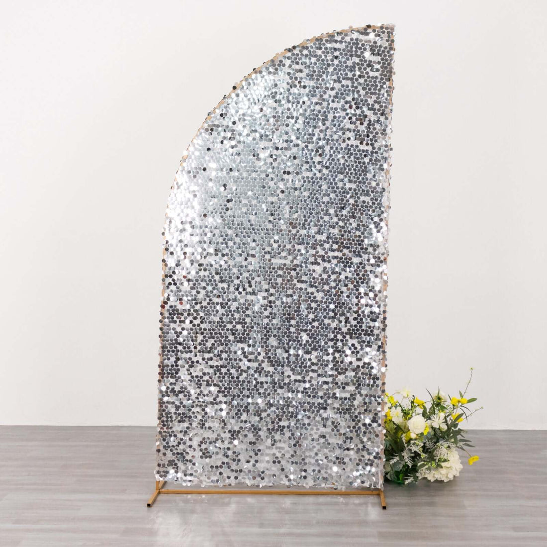Silver sequin backdrop decoration for events and photoshoots.
