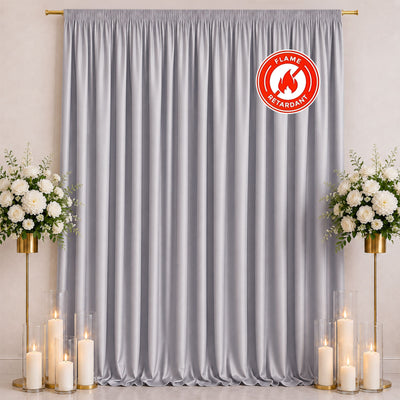 Silver flame-retardant curtains with floral decor and candle stands