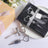 Heart-shaped wine bottle opener and stopper set in gift box.