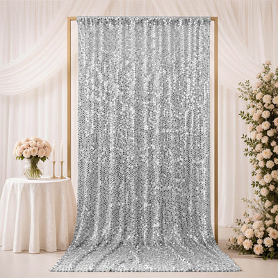 Silver sequin wedding backdrop curtain with elegant floral decor
