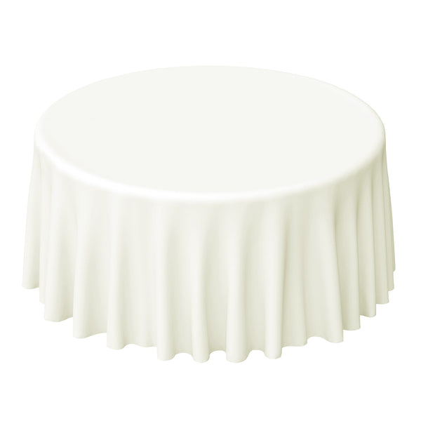 Round table with a white tablecloth, studio-style isolation shot.