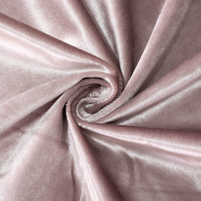 Soft pink velvet fabric texture with elegant swirled folds#whtbkgd