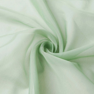 Light green sheer fabric, softly draped in a swirl pattern. #whtbkgd
