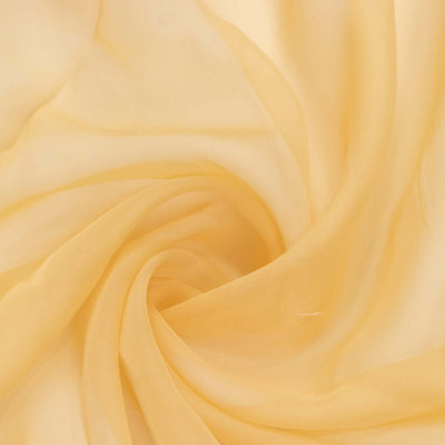 Light yellow sheer fabric draped in soft folds. #whtbkgd