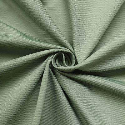 Green fabric texture with a soft, smooth finish.