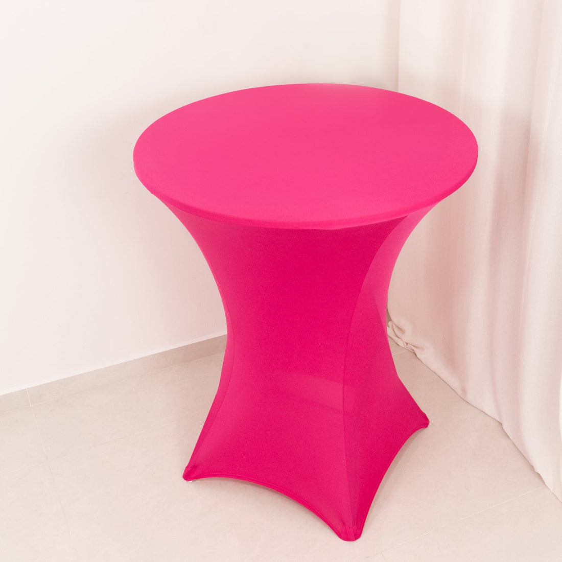 Pink cocktail table with a sleek design for events and gatherings