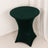 Green stretch table cover on a round table in a minimalist setting.
