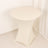 Round white table with a unique base design