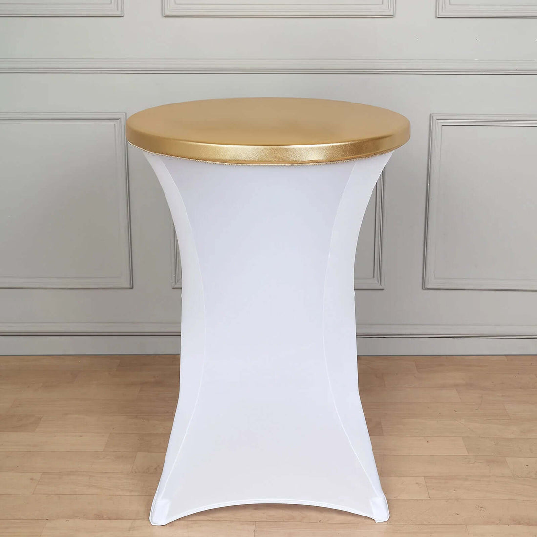 Gold top cocktail table with white stretch cover