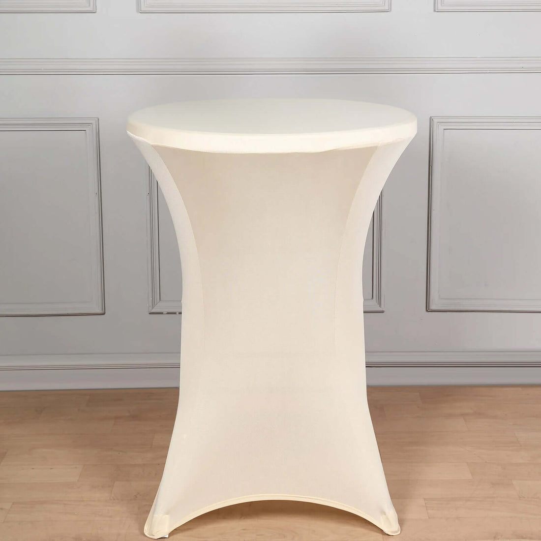 White stretch table cover for round tables, perfect for events and gatherings.