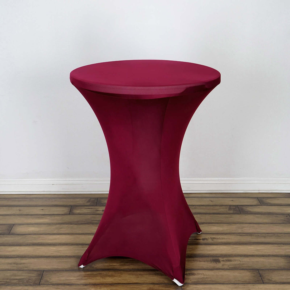 Maroon stretch table cover for round cocktail table