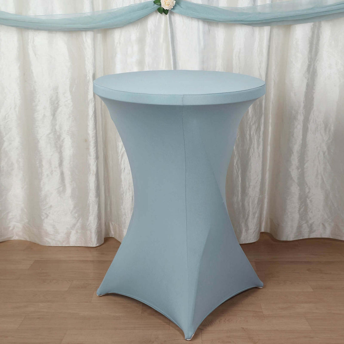 Blue stretch table cover for events and parties.