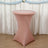 Pink cocktail table with a sleek design against a soft backdrop.