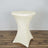 Ivory cocktail table with a sleek design and curved base