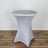 Gray stretch table cover on a round table against a plain background.