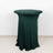 Green fitted table cover on a round table against a plain background