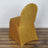 Gold glitter chair cover on a plain backdrop.