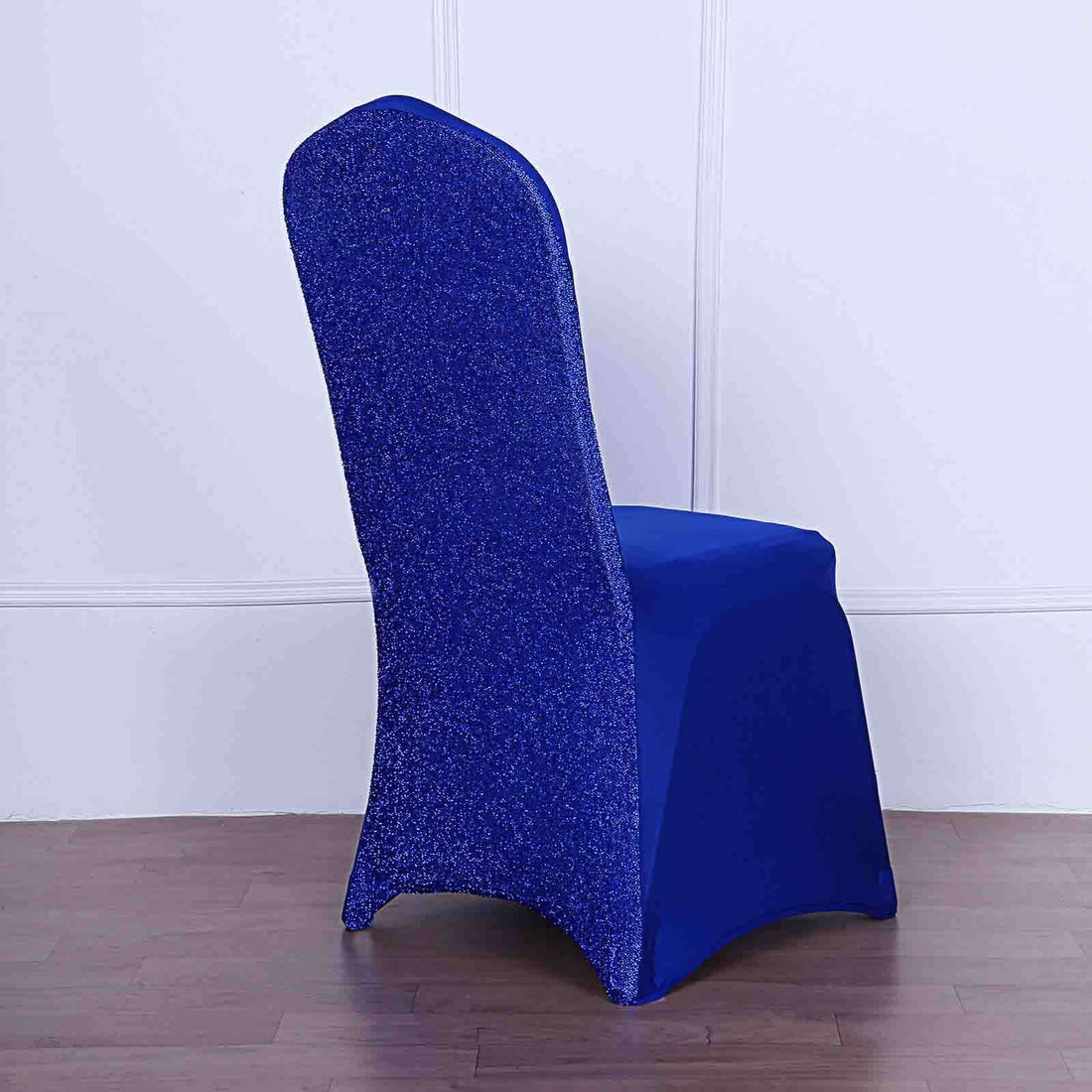 Blue glitter chair cover on a wooden floor.