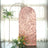 Rose gold sequin backdrop with floral accents for events and photo shoots.