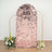Pink sequin backdrop with gradient design and floral arrangements