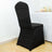 Black chair cover with pleated design, perfect for elegant events.