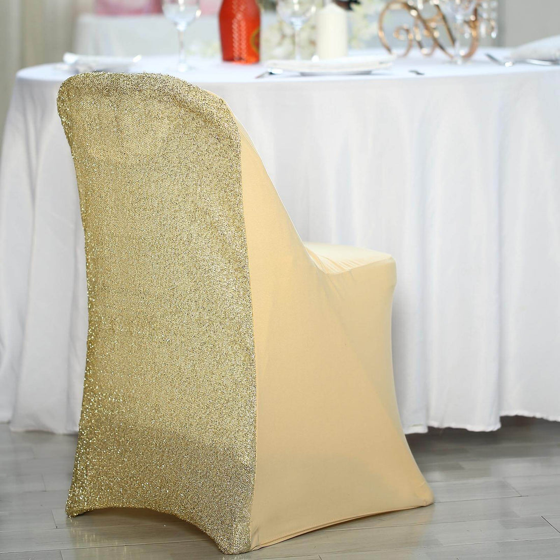 Elegant gold sequin chair cover for events and weddings.