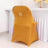 Elegant mustard chair cover with decorative back detail
