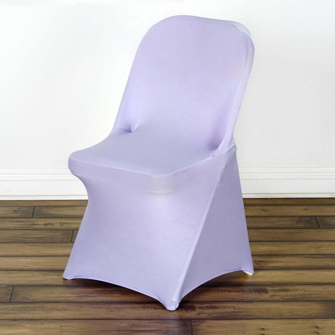 Purple folding chair on a wooden floor.