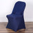 Navy blue chair cover on a modern chair against a plain background.