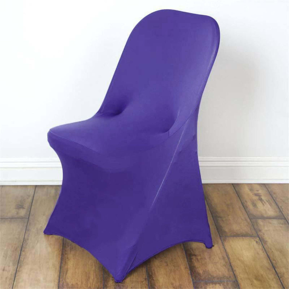 Purple chair cover on a white backdrop.