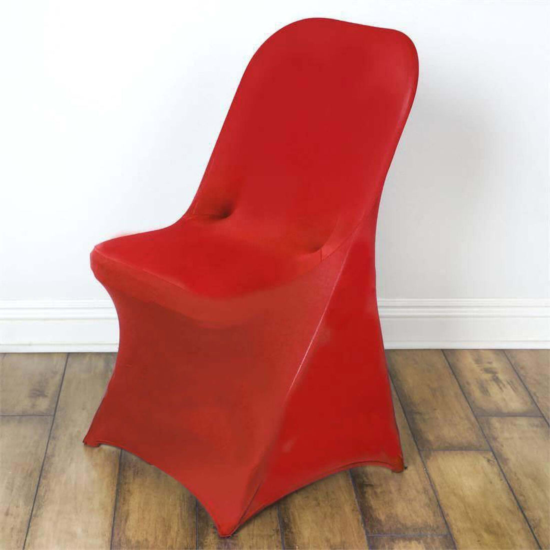 Red chair on a wooden floor background.