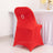 Red chair cover with decorative ring, perfect for events and decor.