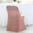 Rose gold sequined chair cover on a dining chair at a festive table setting.