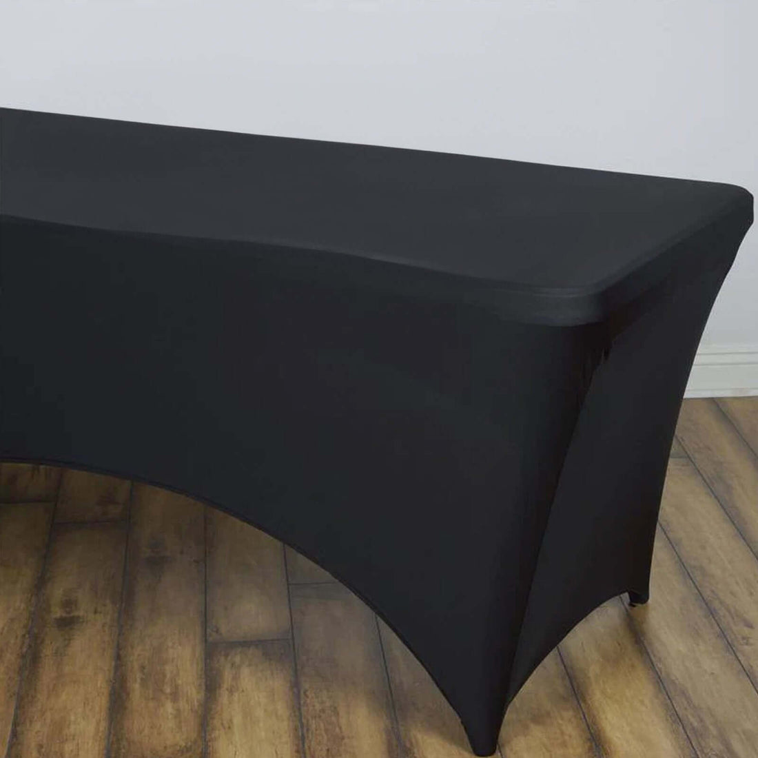 Black stretch table cover for events and displays.