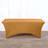 Golden table cover on a plain backdrop