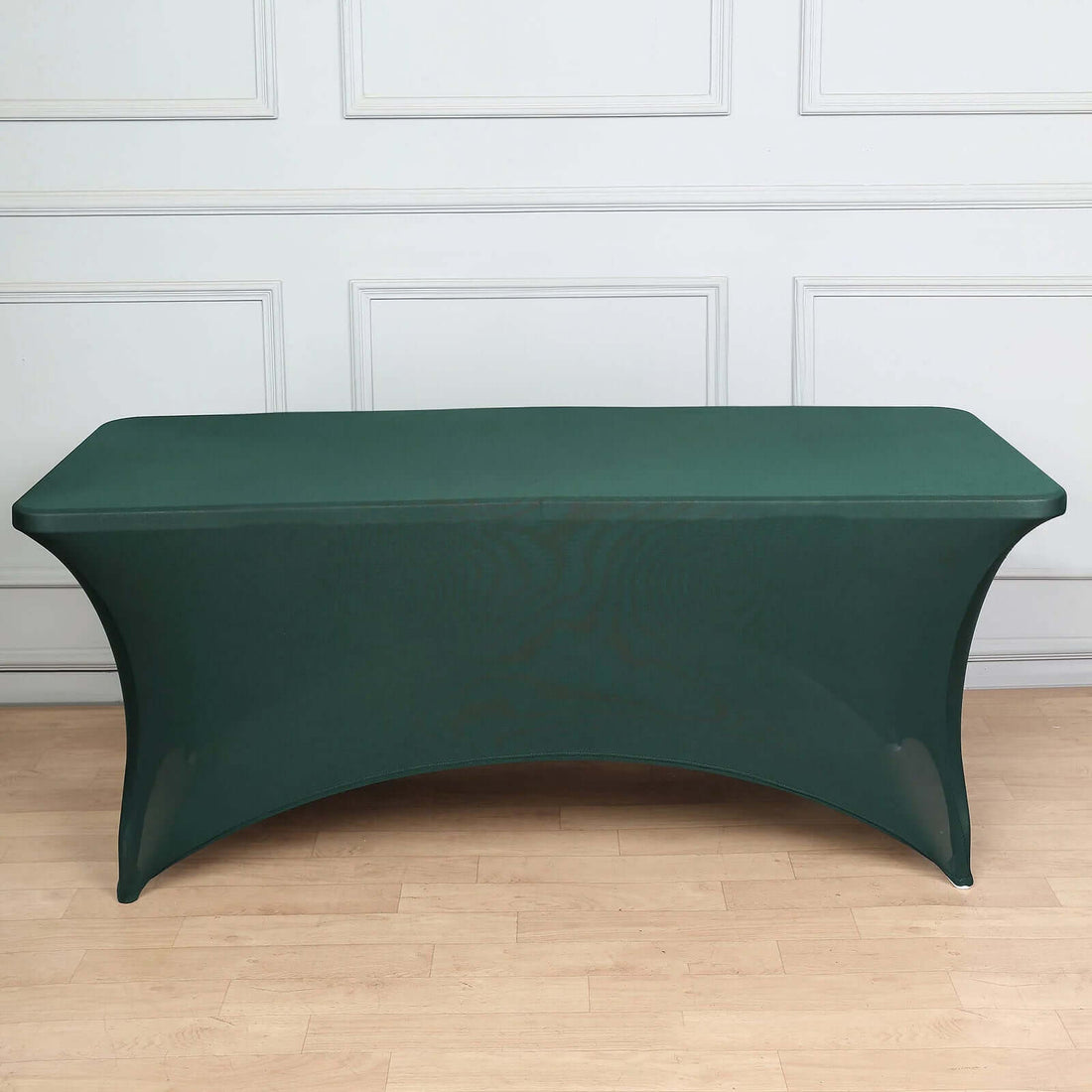 Green stretchy table cover for events and parties.