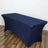 Navy blue table cover on a wooden floor.